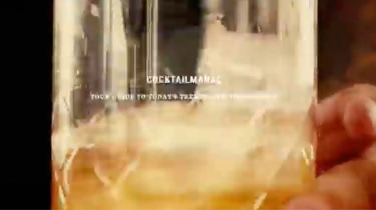 close up of a cocktail in a highball glass